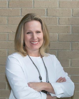 Portrait of Debra Crumbie, Broker